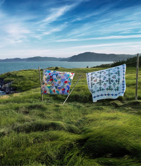 Quilts hanging from a clothesline